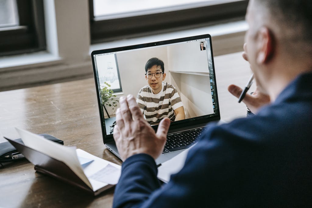 Photo Of Professor Mentoring His Student